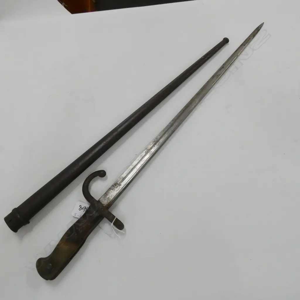 HOOKED QUILLON BAYONET IN STEEL SCABBARD, BLADE L.530mm Image 1++