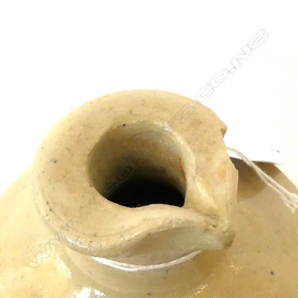 FOUR STONEWARE BOTTLES (CHIPS) Image 1++