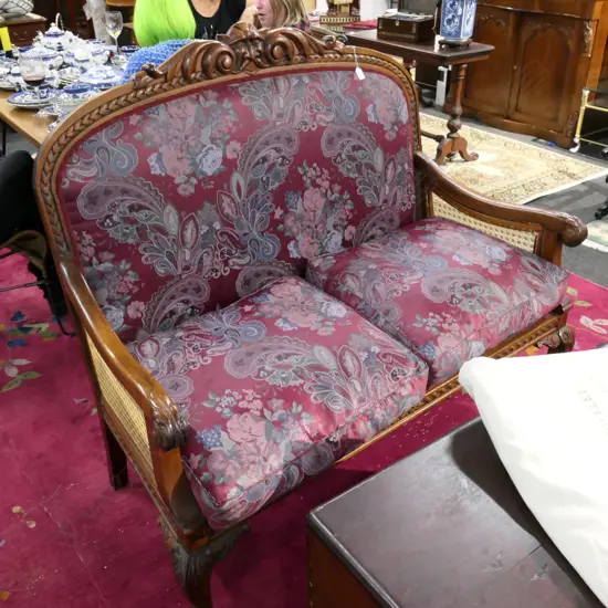 SETTEE 2 SEATER CARVED FRAME CANED ARMS