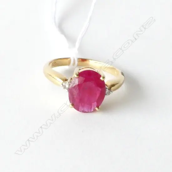 18CT GOLD RUBY AND DIAMOND RING