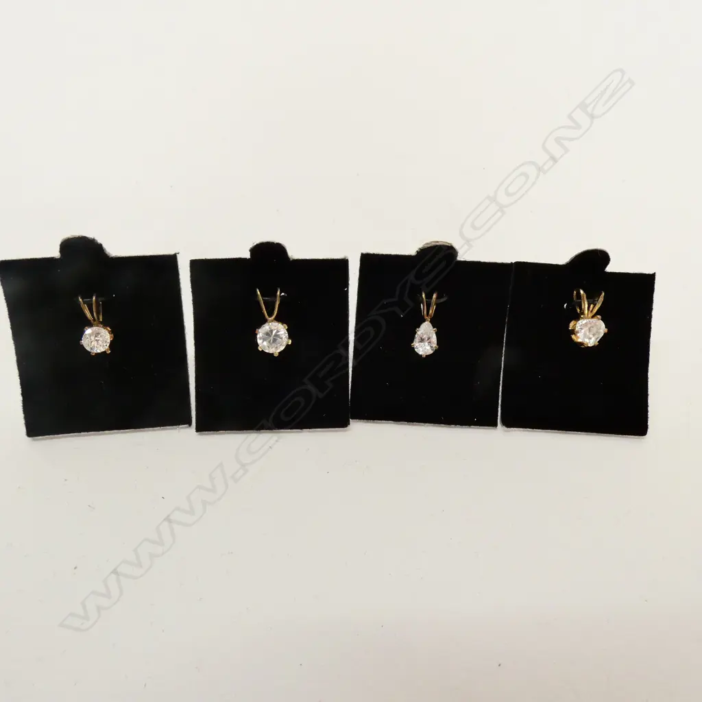 FOUR FAUX DIAMOND PENDANTS Image 1++