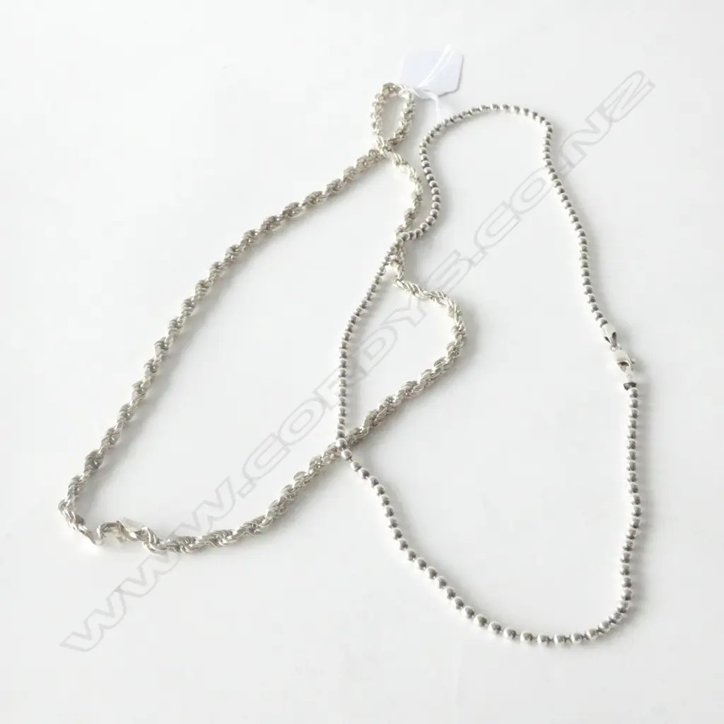 TWO SILVER CHAINS Image 1++