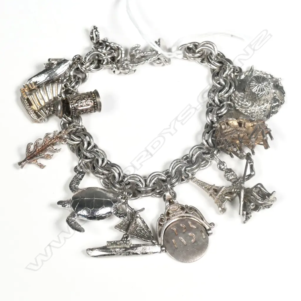 STG SILVER BRACELET AND CHARMS Image 1++