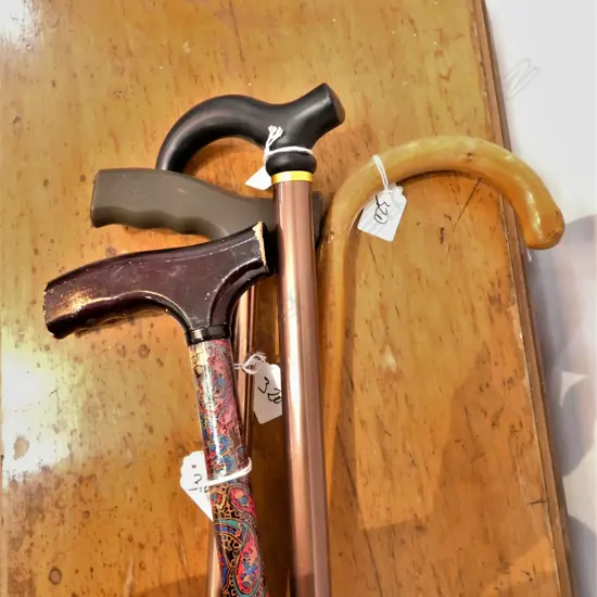 4 WALKING STICKS; 3 METAL + 1 CANE