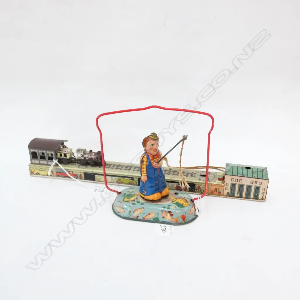 2 TIN PLATE TOYS - FISHING CLOWN & TRAIN ON TRACK Image 1++