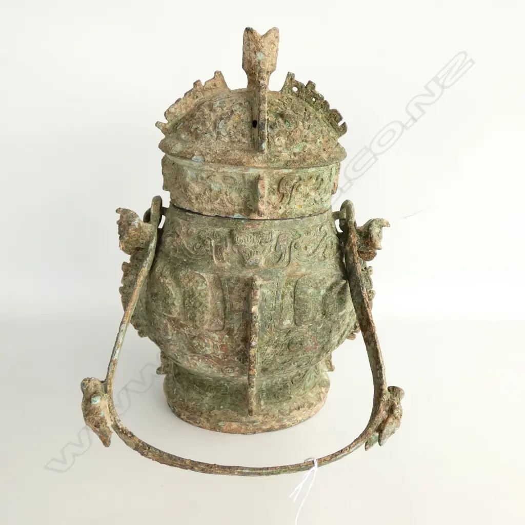 CHINESE BRONZE ARCHAIC-STYLE SWING HANDLED URN, H.310mm Image 1++