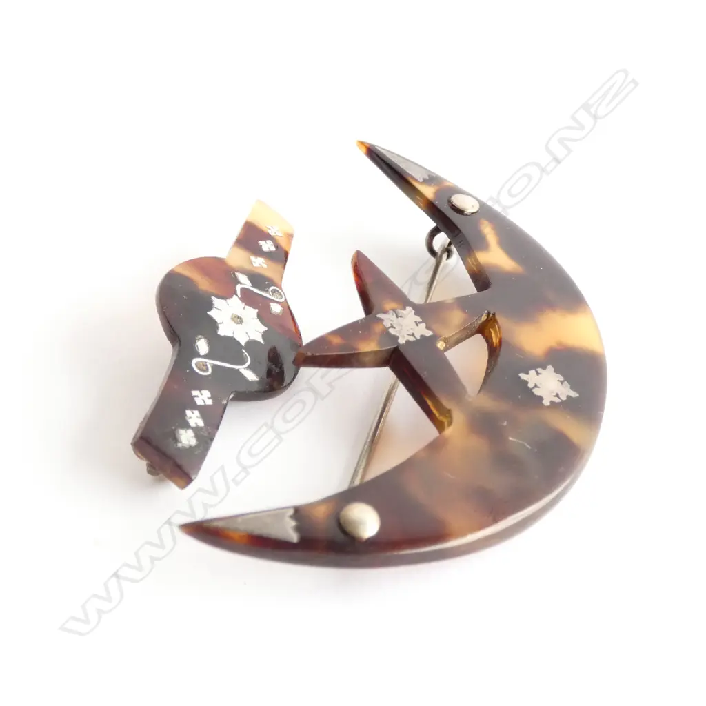 TWO PACIFIC TORTOISE SHELL AND SILVER BROOCHES Image 1++