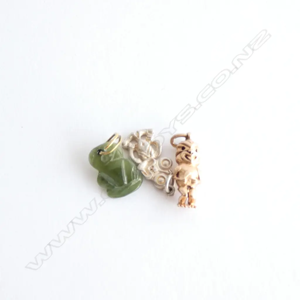THREE MAORI DESIGN CHARMS - POUNAMU/SILVER/GOLD Image 1++