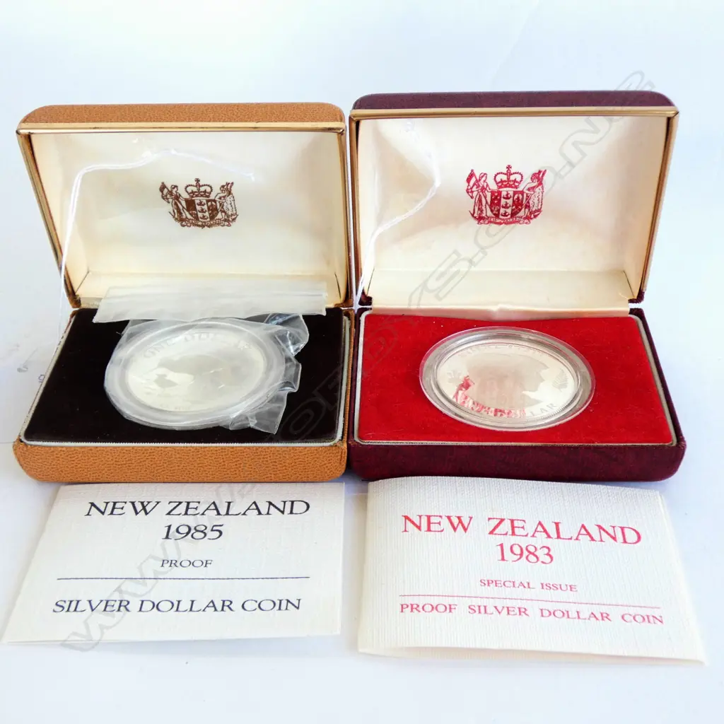 TWO NZ SILVER DOLLARS - BOXED - '85 BLACK STILT/'83 CHARLES & DI Image 1++