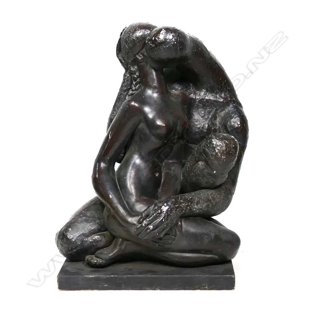 A large composite/plaster sculpture of an embracing couple, the male with textured finish, his companion smooth. H. 740mm. Image 1++