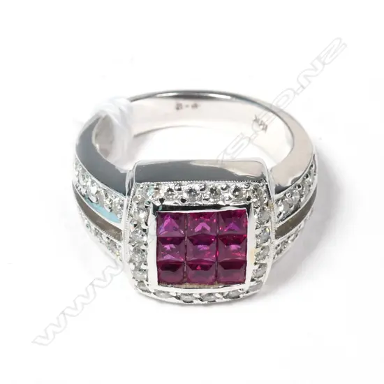 18 CT WHITE GOLD RING PRINCESS CUT RUBIES SURROUNDED BY DIAMONDS