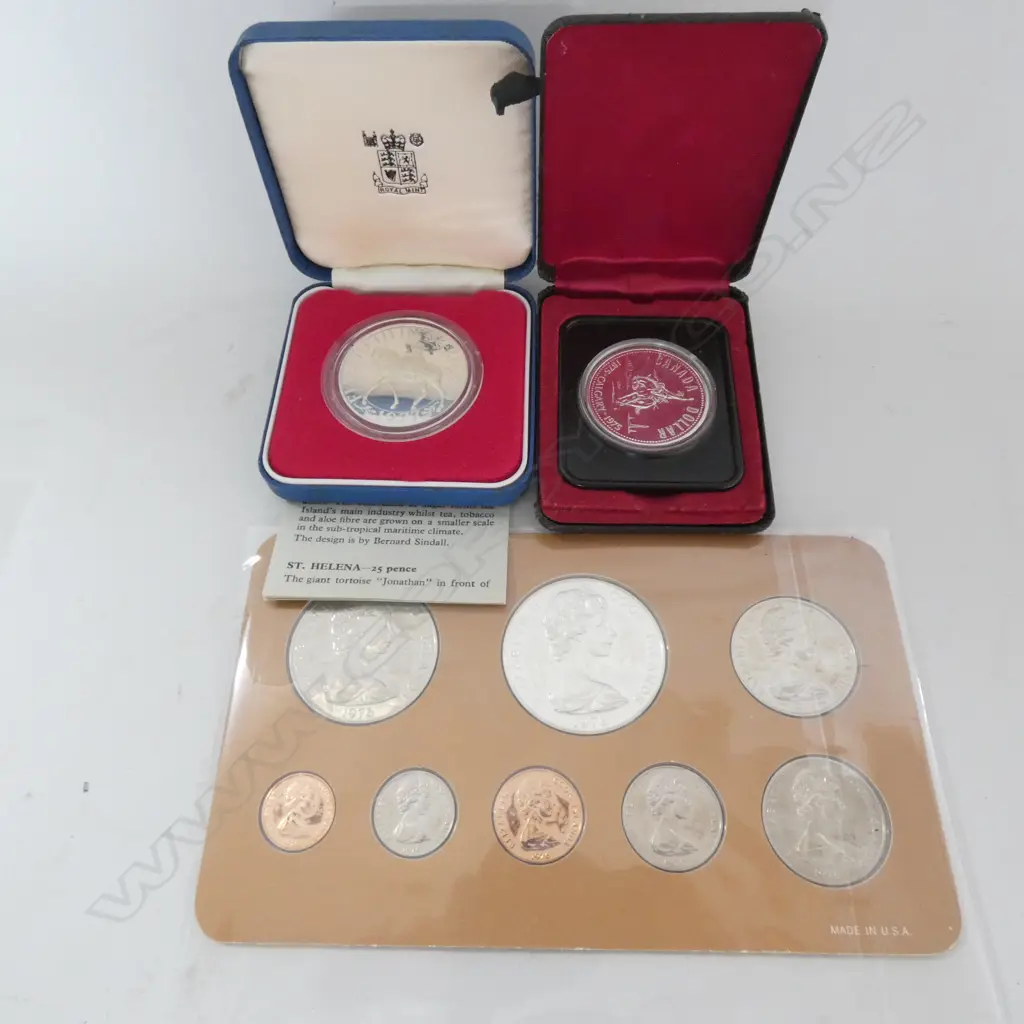 FRANKLIN MINT COOK IS UNC. COINS, 1 CANADIAN DOLLAR ETC, Image 1++