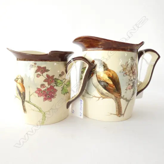 PAIR ROYAL DOULTON KOOKABURRA JUGS 1 A/F H. 120MM