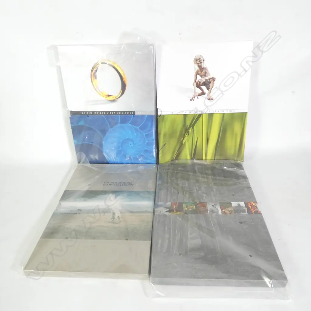 4 'THE NEW ZEALAND COLLECTION' STAMP BOOKS; 2002 - 2005 Image 1++