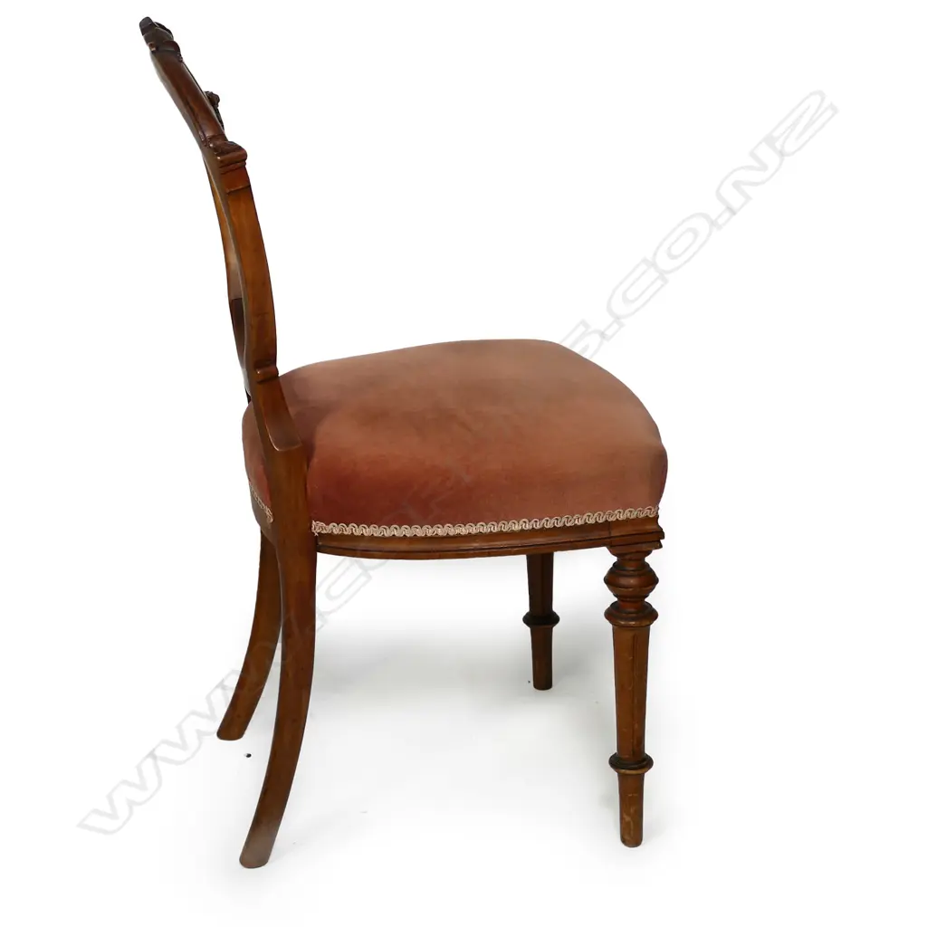 A set of six Victorian carved walnut balloon back chairs, traditional open oval backs finely detailed, turned front legs. Image 1++