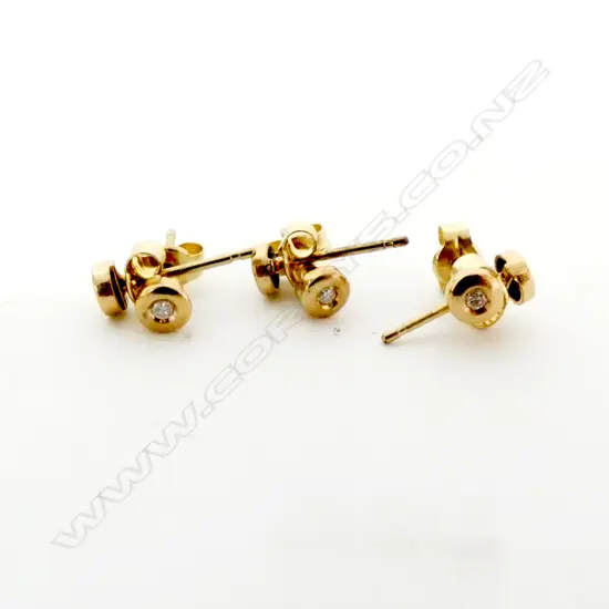 THREE PAIRS OF 9CT GOLD AND DIAMOND STUD EARRINGS