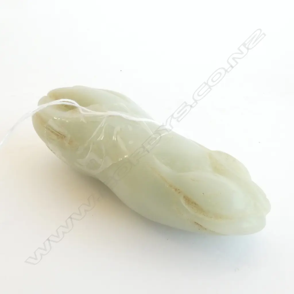 JADE FINGER CITRON HANDLING STONE, L. 90MM Image 1++