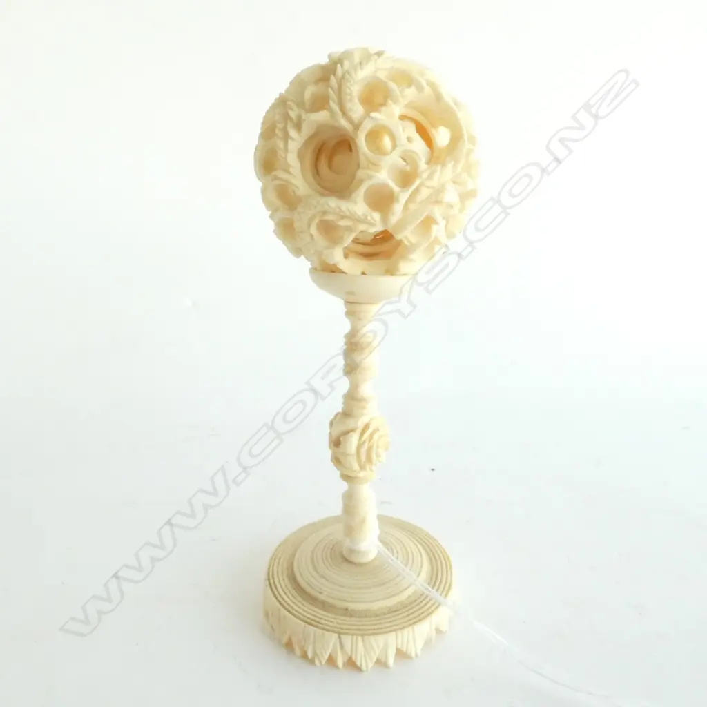 SMALL CARVED IVORY PUZZLE BALL ON STAND Image 1++