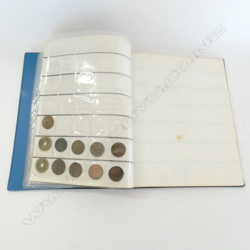 FOLDER OF INTERNATIONAL COINS  Image 1++