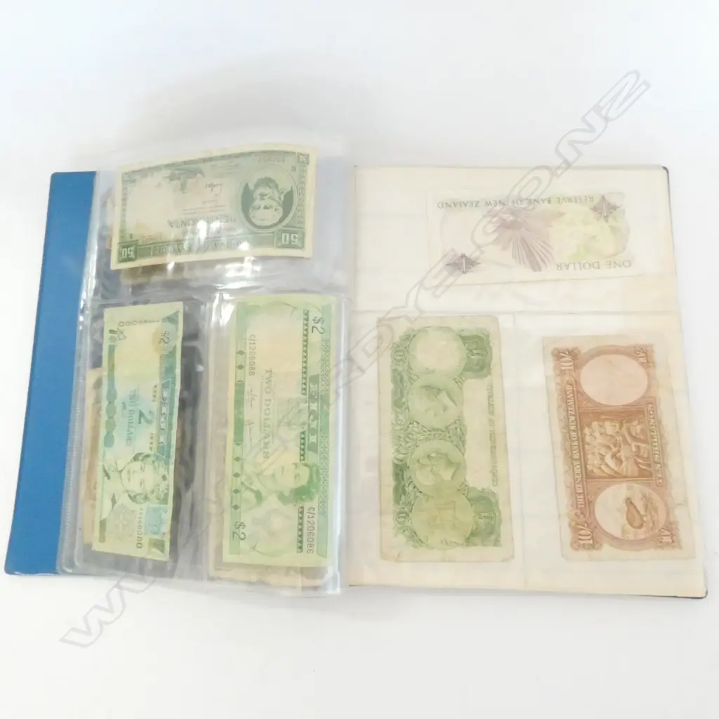 FOLDER OF INTERNATIONAL COINS  Image 1++