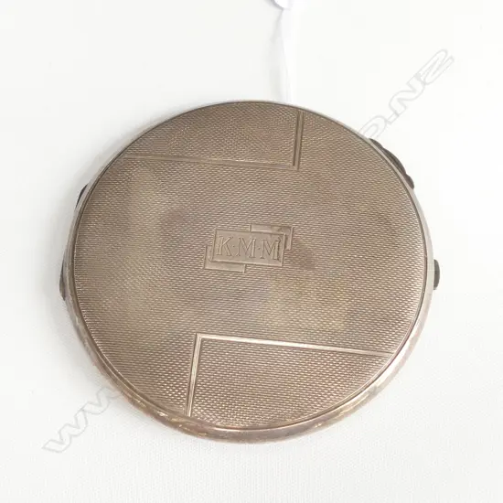 STG SILVER CIRCULAR COMPACT 'K.M.M' 80MM DIA 