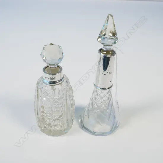 TWO CRYSTAL AND SILVER PERFUME BOTTLES