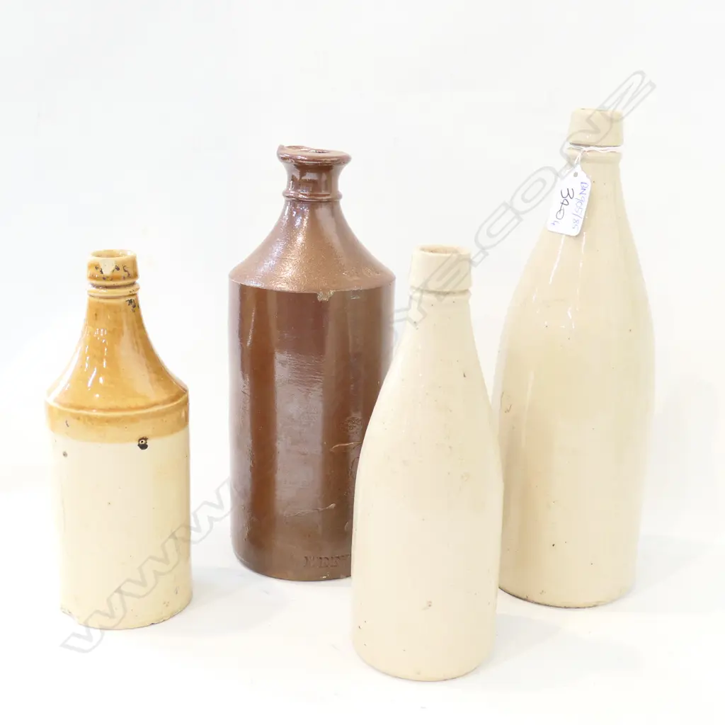 COLLECTION OF 4 CERAMIC BOTTLES Image 1++