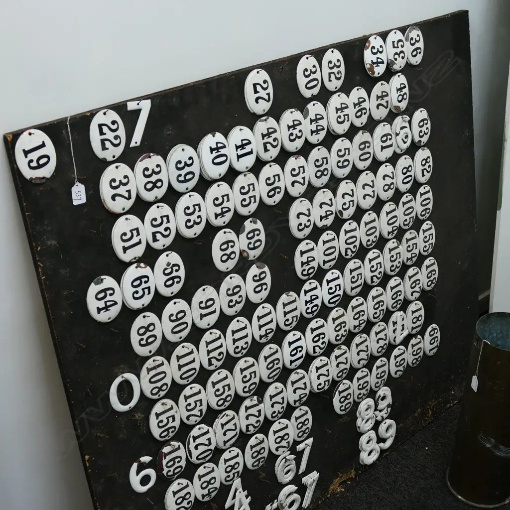 COLLECTION OF VINTAGE ENAMEL NUMBERS ON PLY BOARD 1200MM H Image 1++