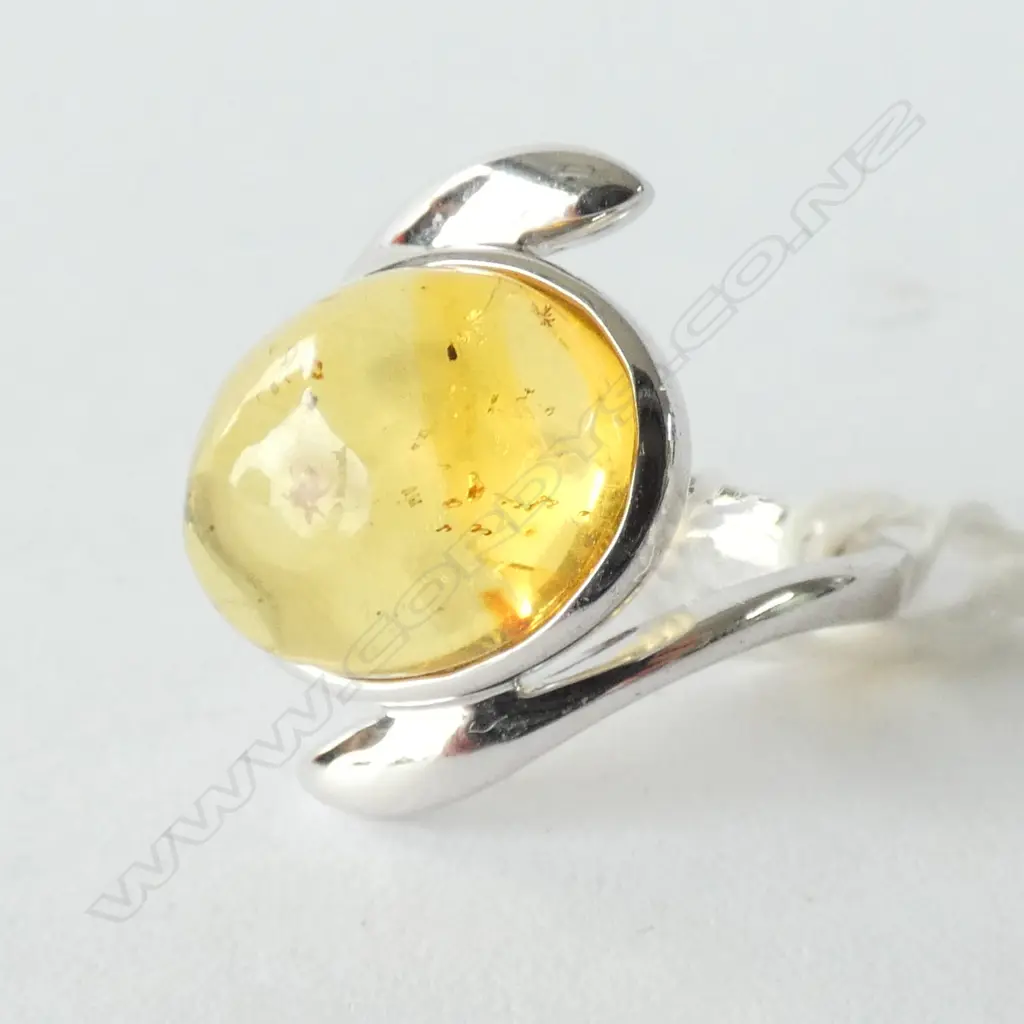SILVER  MOUNTED AMBER INSECT RING Image 1++