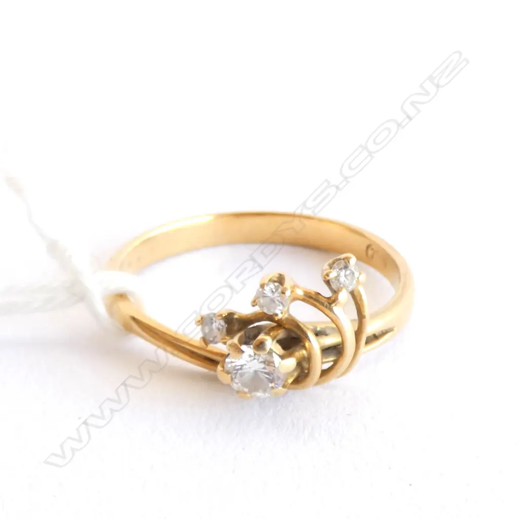 18ct  DIAMOND 4 STONE TWIST RING Image 1++