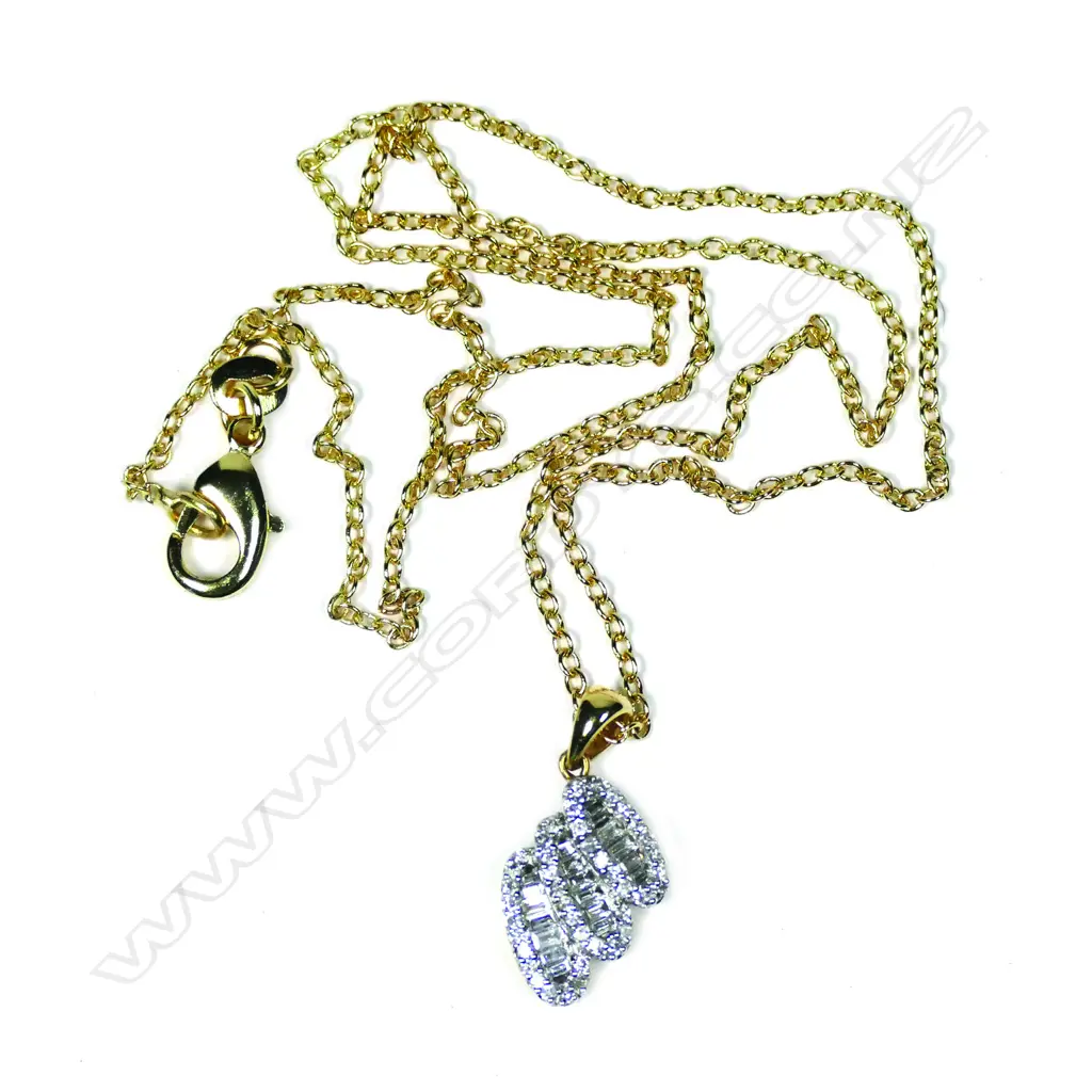 An 18ct white gold and diamond triple oval form pendant Image 1++