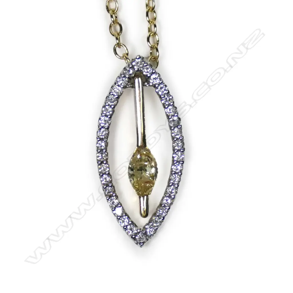 An 18ct white and yellow gold and diamond pendant Image 1++