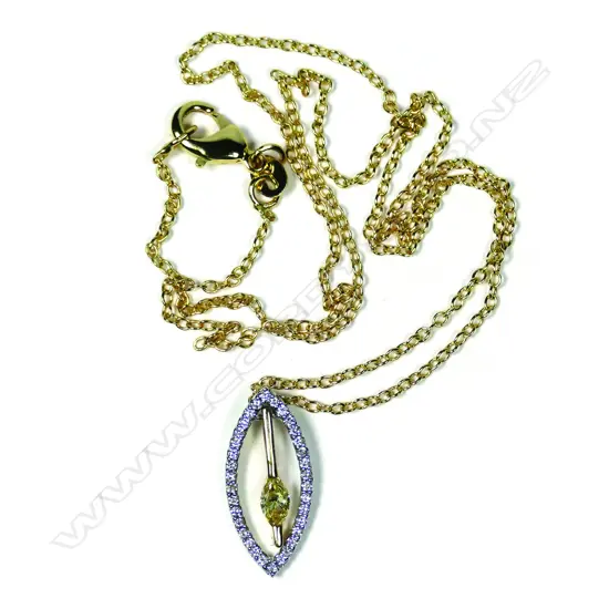 An 18ct white and yellow gold and diamond pendant