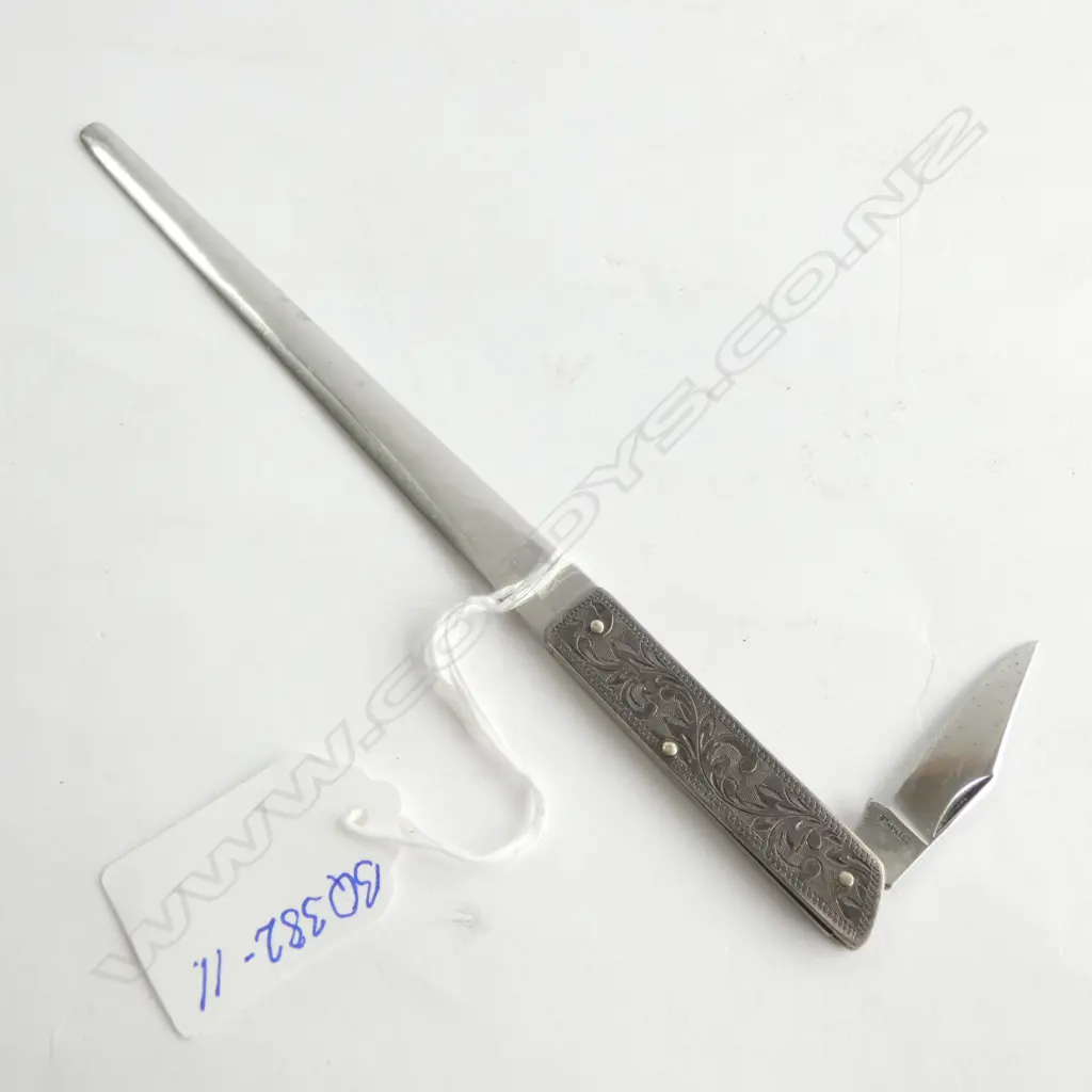 (010) SILVER HANDLED STEEL LETTER KNIFE Image 1++