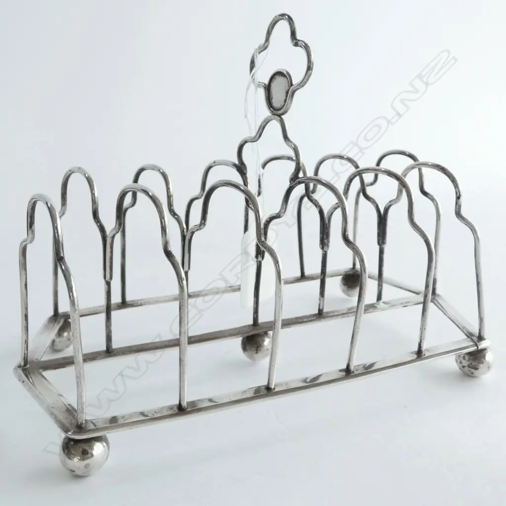 SIX SLICE STG SILVER TOAST RACK, TESTED, ODD HALLMARKS, NO DATE MARK. SPLIT TO BASE CORNER, 180GMS Image 1++