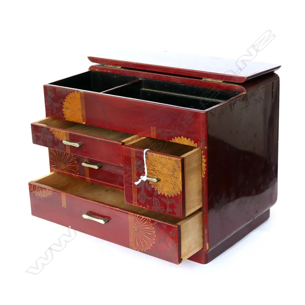 Dark red lacquer. Half hinged lid above 4 drawers. Gilt chrysanthemum decoration. 320 x 220 x 250mm Image 1++