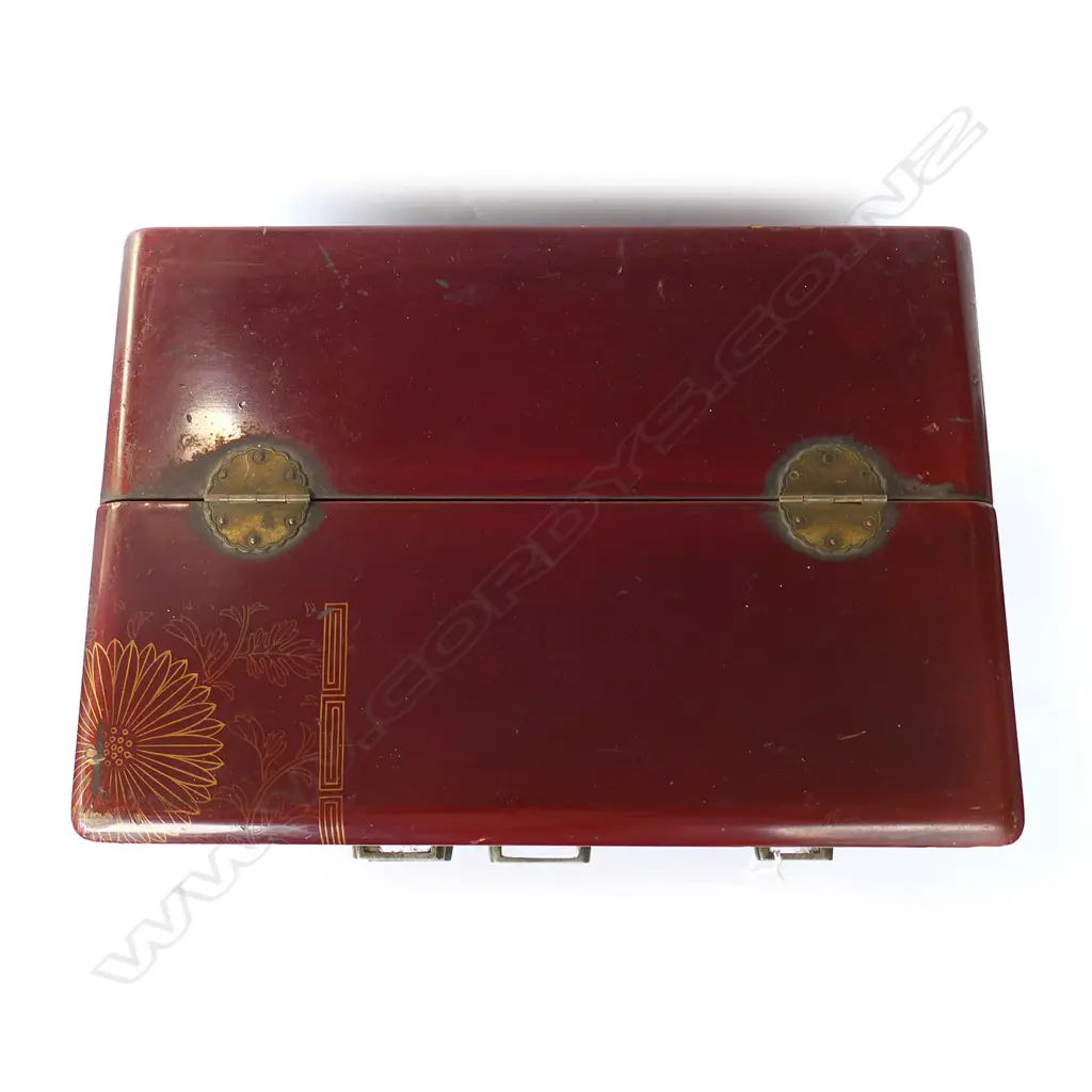 Dark red lacquer. Half hinged lid above 4 drawers. Gilt chrysanthemum decoration. 320 x 220 x 250mm Image 1++