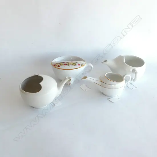 FOUR ANTIQUE FEEDING CUPS. LARGEST DIA 110MM