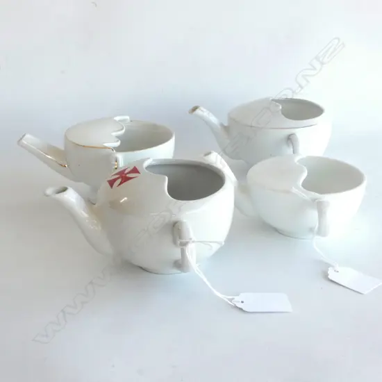 FOUR ANTIQUE FEEDING CUPS INCL 1 WTH ODD SHAPED CROSS, LARGEST DIA. 95MM