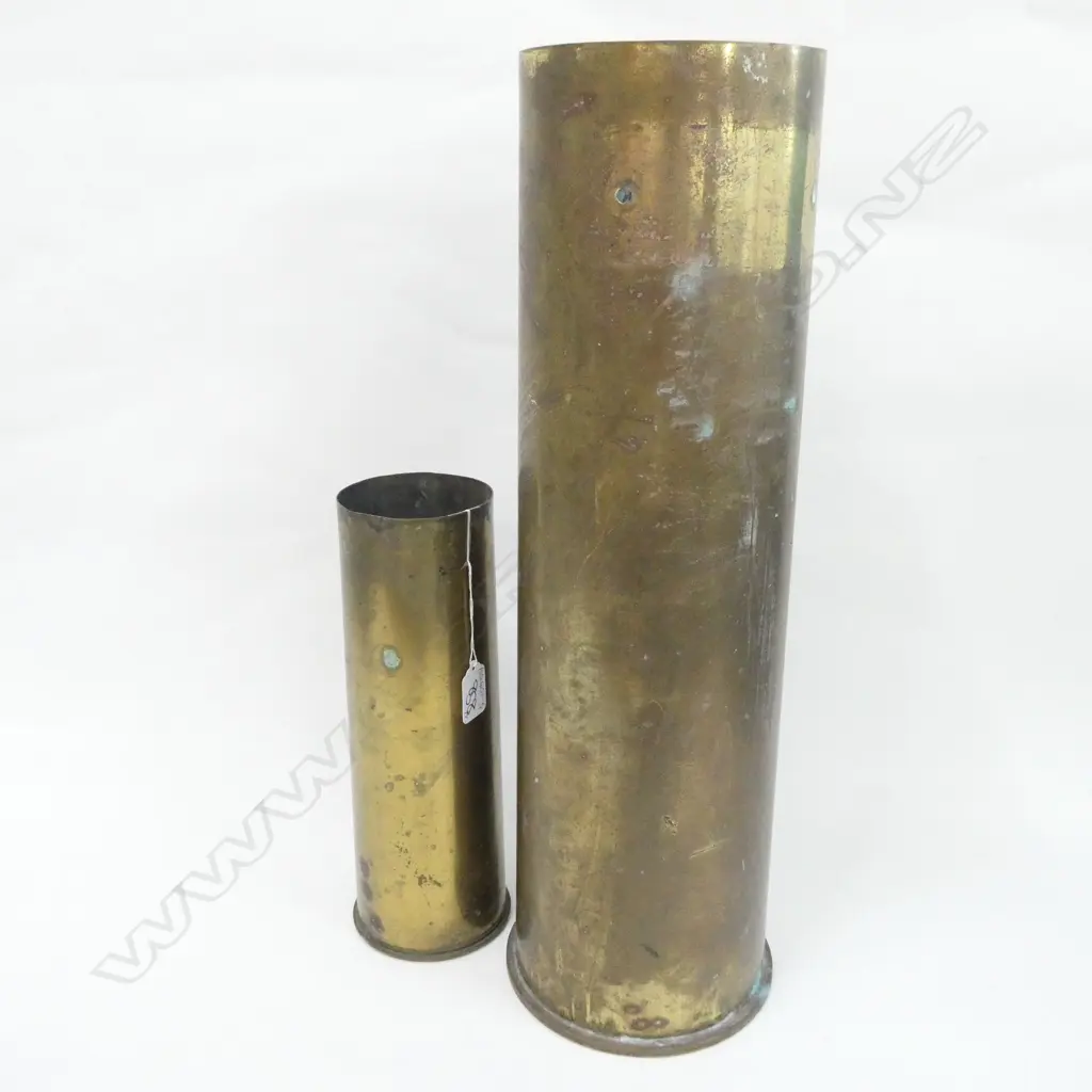 TWO BRASS SHELL CASINGS LG. H. 520 X DIA. 145MM. SM. H. 290 X DIA. 90MM Image 1++