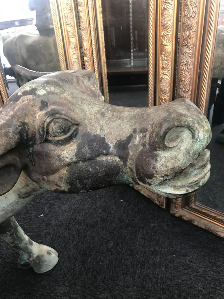 An old and well modelled bronze statue depicting the Zen Buddhist expression of spirit - Riding the Bull Home Image 1++