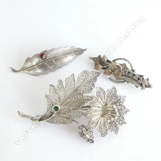 SILVER BROOCHES