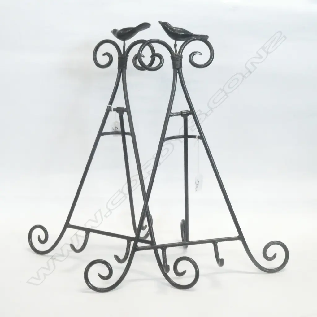 PAIR BIRD THEMED BLACK METAL BOOK STANDS. H. 500MM Image 1++