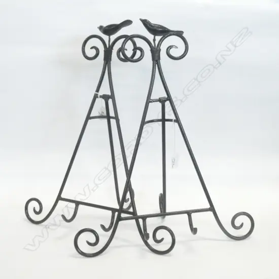 PAIR BIRD THEMED BLACK METAL BOOK STANDS. H. 500MM