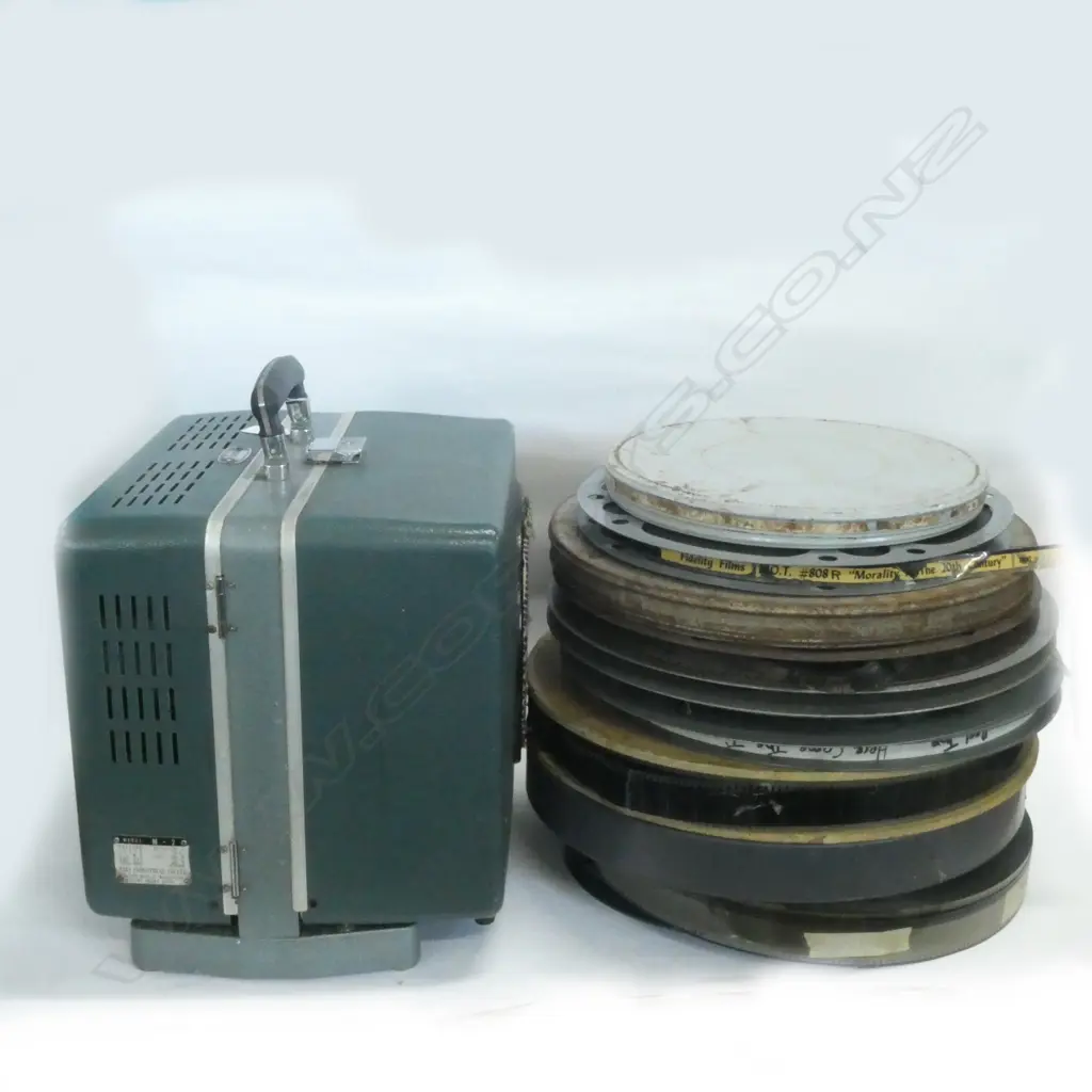 16MM EIKI PROJECTOR + FILMS Image 1++