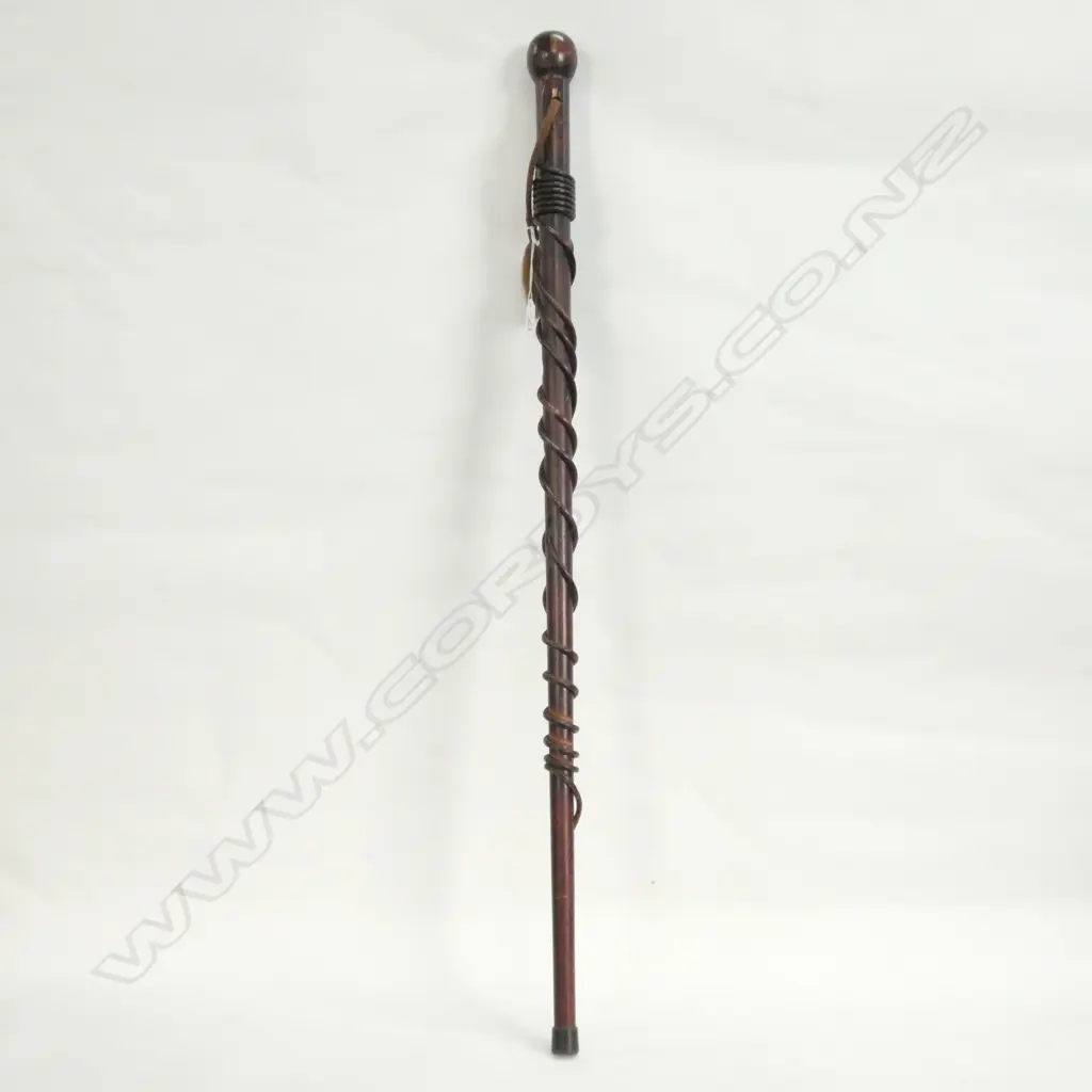 A VINTAGE MAORI WALKING STICK WITH INLAID PAUA AND SUPPLEJACK DECORATION  Image 1++