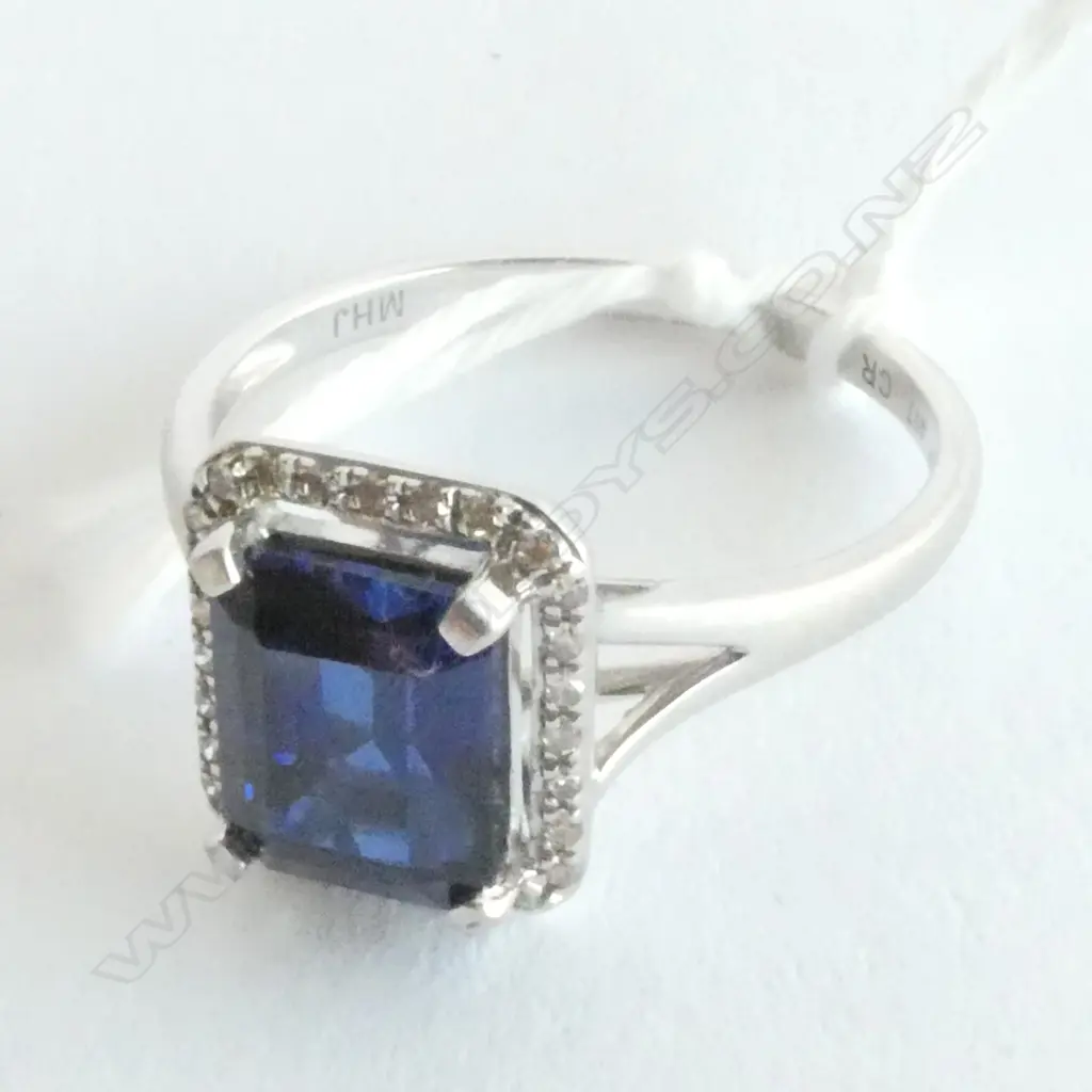 SYNTHETIC SAPPHIRE & NATURAL DIAMOND RING SET IN 10CT WHITE GOLD Image 1++