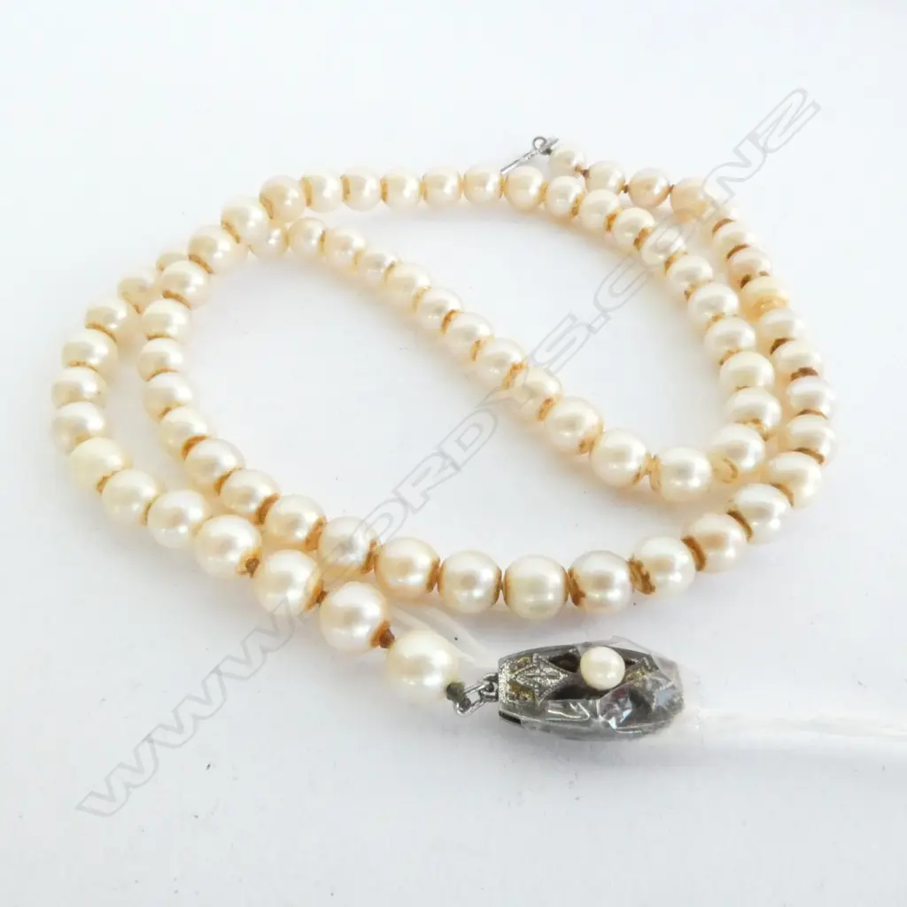MIKIMOTO PEARLS, SINGLE STRAND, STERLING SILVER CLASP STAMPED WITH THE FAMOUS 'M', 480mm Image 1++