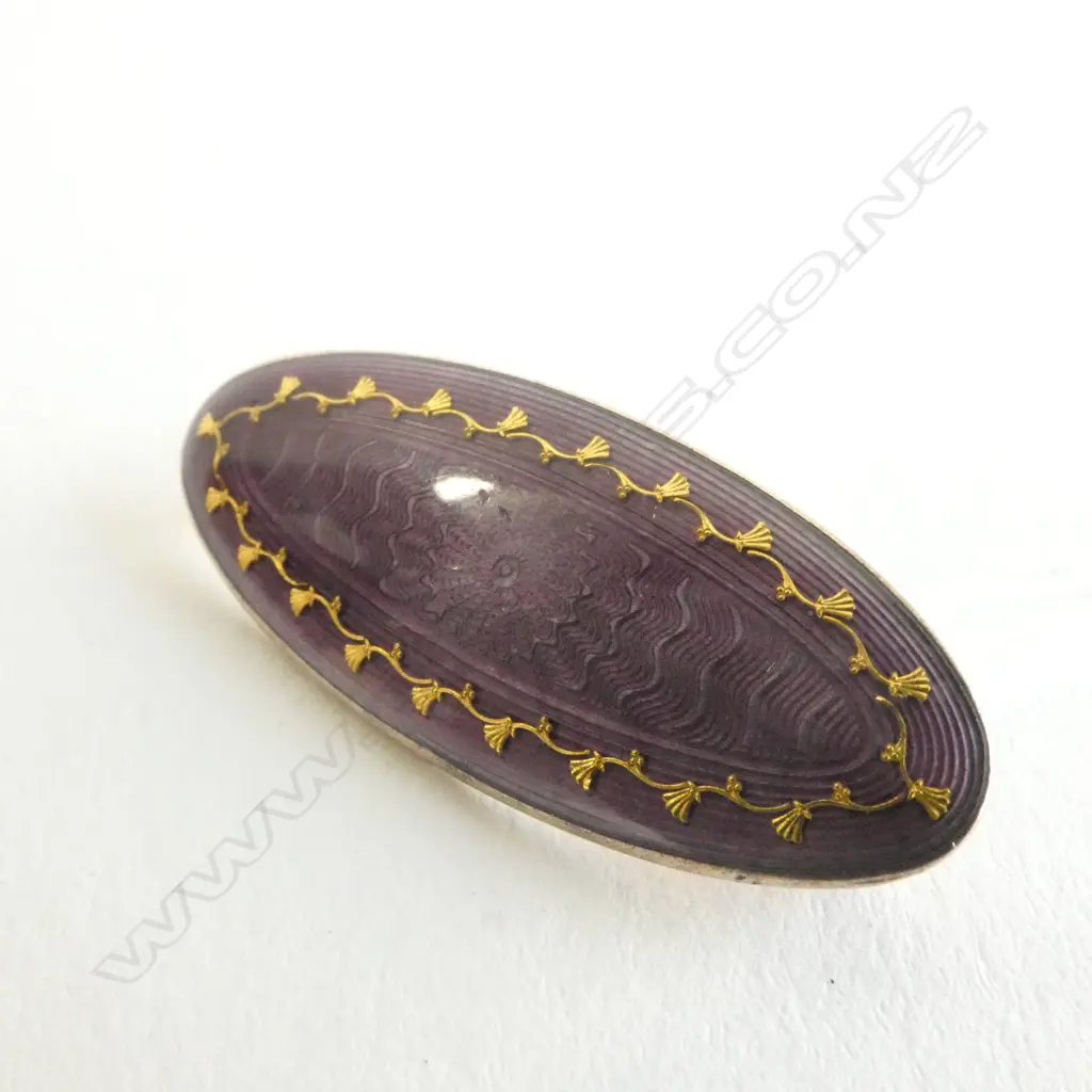 ARTS AND CRAFTS SILVER AND ENAMEL BROOCH Image 1++