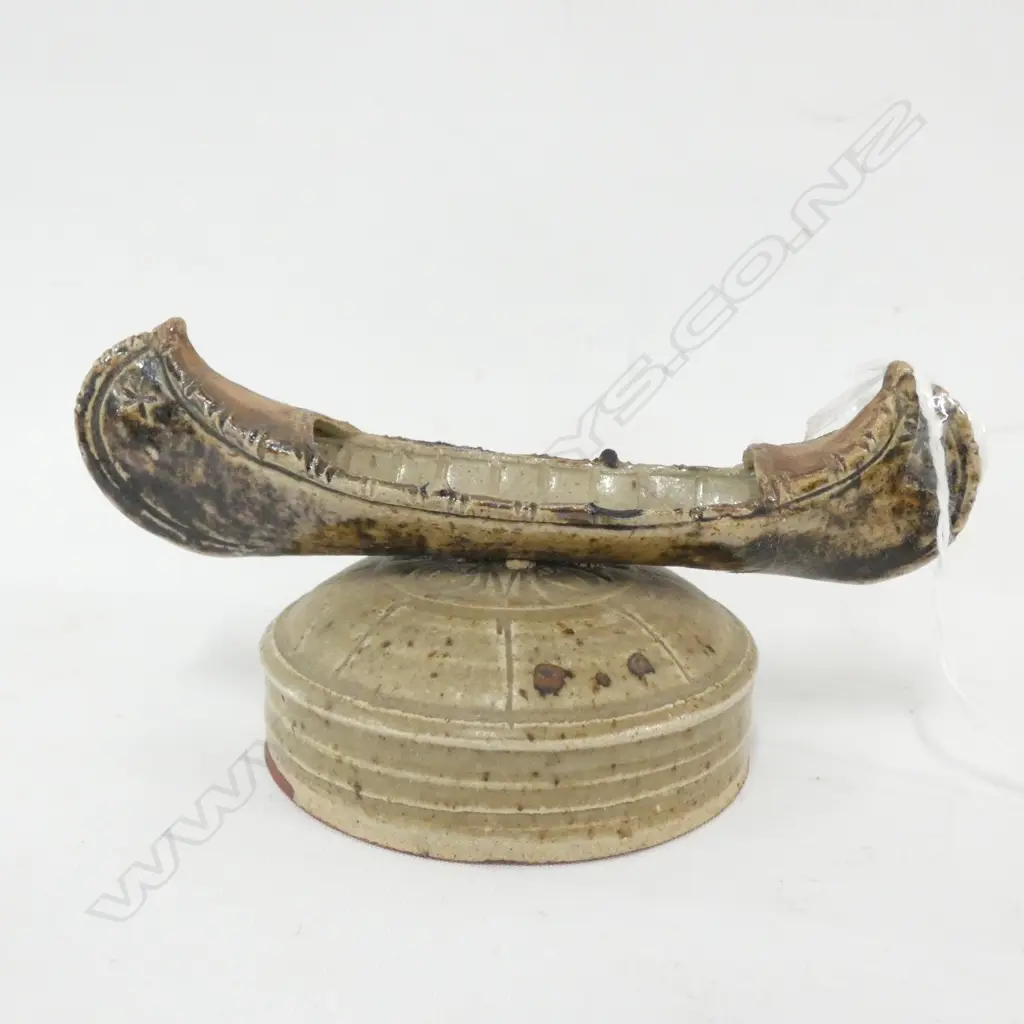 NZ STUDIO POTTERY GREIG BARNETT - SCULPED CANOE ON STAND D140MM Image 1++